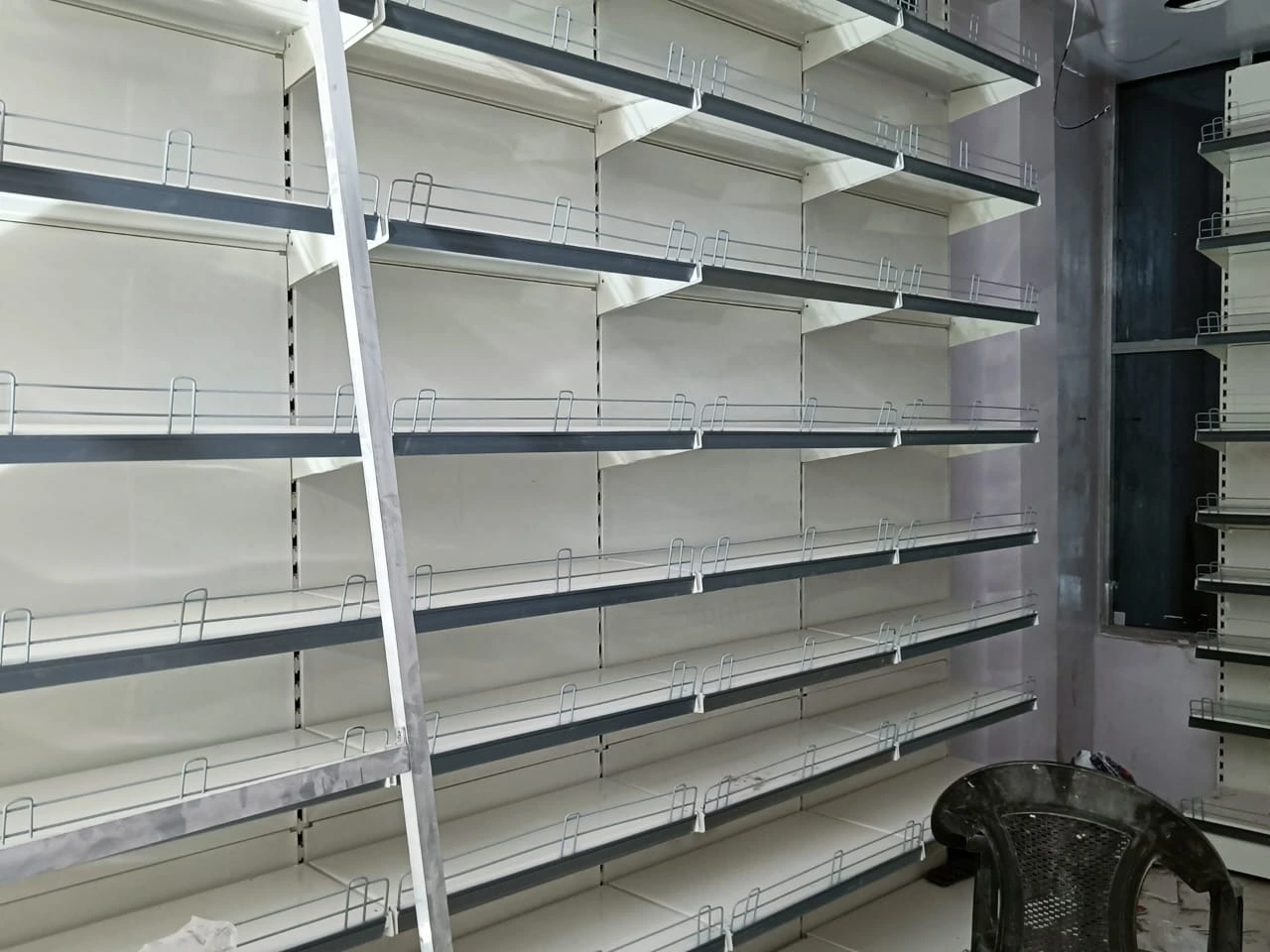 634221566_garment display racks installation jhansi5.webp